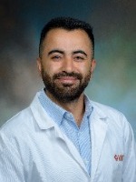 Al-Bkoor, Basel headshot in white coat