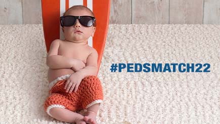 cute baby on carpet in front of Pedsmatch22