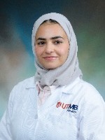 Quran, Sana'a headshot in white coat