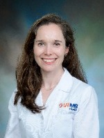 Ariel Schmid headshot in white coat