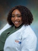 Symister, Chanika headshot in white coat