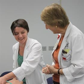 Resident Karen Welch, MD and Barbara Thompson, MD doing a demonstration during a student workshop