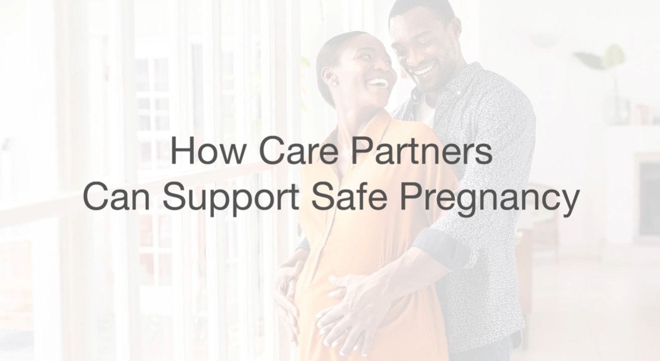 photo of happy pregnant African American couple in a home