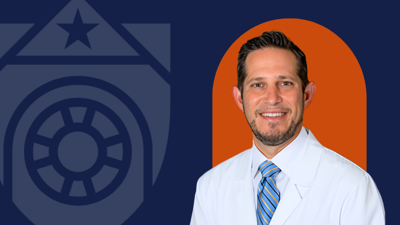 A man on a navy graphic that features the UTMB logo and an orange backdrop directly behind him