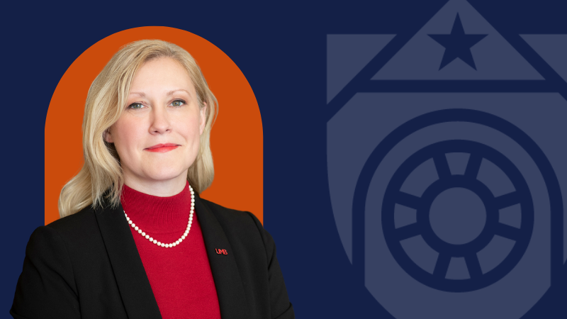 A woman on a navy background with the UTMB logo on the right and an orange backdrop behind the woman