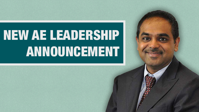 Graphic with a light teal background showing a person in a black blazer beside a dark teal box containing the text ‘New AE Leadership Announcement.’