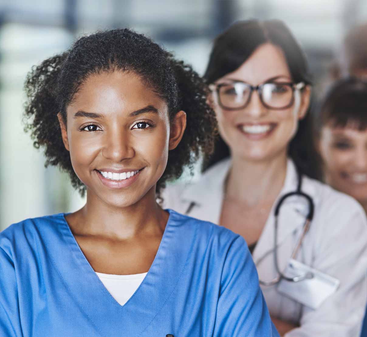 The team that saves lives. Portrait of a diverse team of doctors standing together in a hospital.