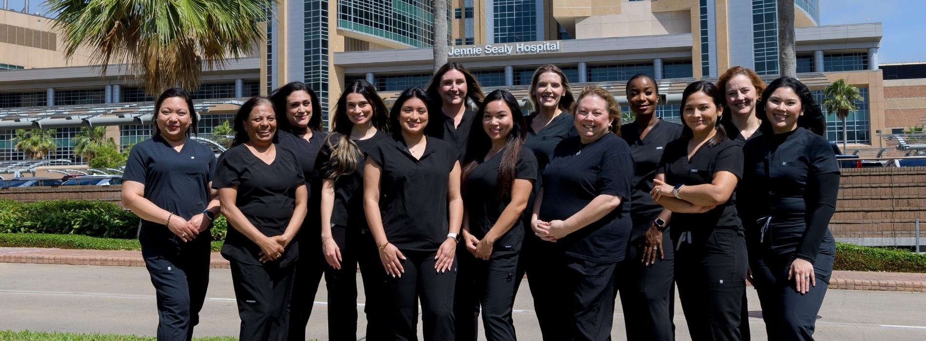 Frontline Nurses in front of Jennie Sealy Hospital