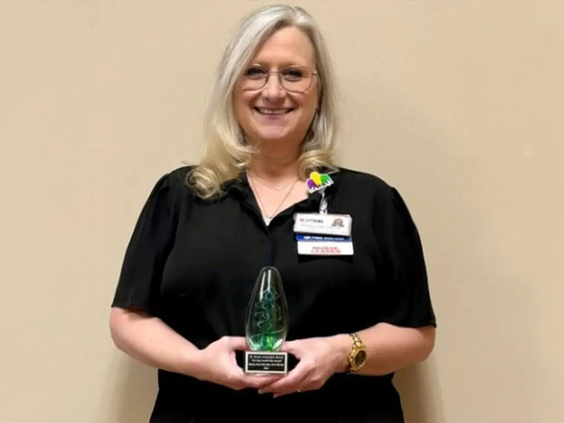 2025 Dr. Josette Armendariz Batiste Award Recipient, Shannon Diaz, smiles holding her award.