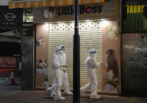 © Kin Cheung/APHong Kong officials investigate a pet shop on Jan. 18 that was closed after a worker's coronavirus infection was linked to several of its hamsters that tested positive. (Kin Cheung/AP)