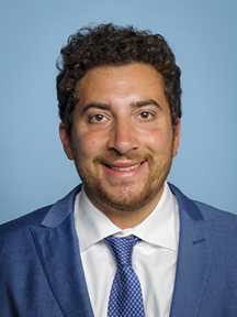 A professional headshot of Vasilis Mavratsas