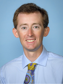 A professional headshot of Samuel Stephenson