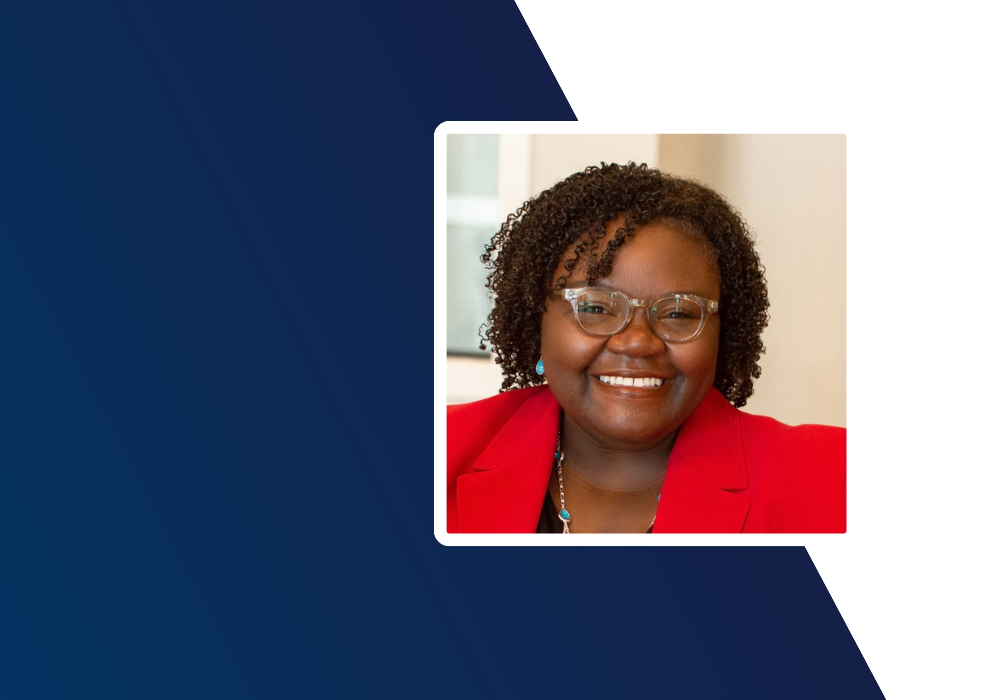 Graphic featuring a headshot of Dr. Patrice Jackson smiling and wearing glasses and a red blazer, framed against a navy blue and white geometric background.