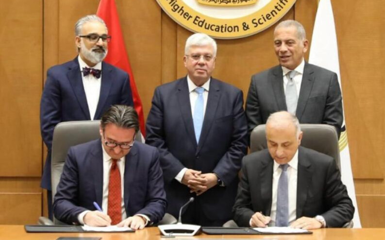 Dr. Reiser and Dr. Malahy signing the collaboration agreement. Also pictured: Dr. Sharma, Dr. Ayman Ashour, Mr. Rashidi