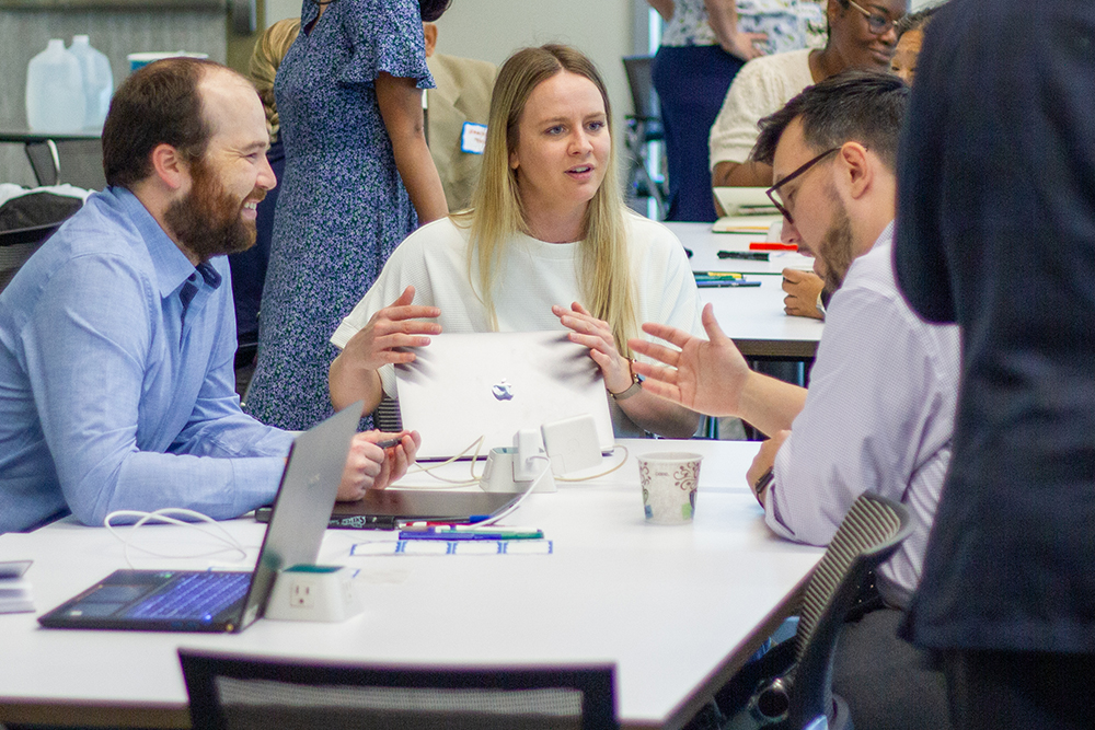 Attendees discussing during a breakout session