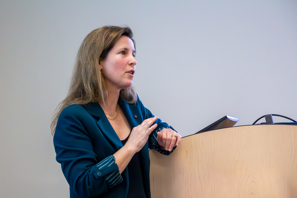 Candid photo of Dr. Norrina Allen speaking at the keynote