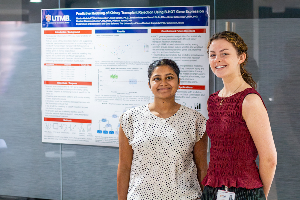 IMG_2803 Two SIBDS students stand beside a poster titled “Predictive Modeling of Kidney Transplant Rejection Using B-HOT Gene Expression.”