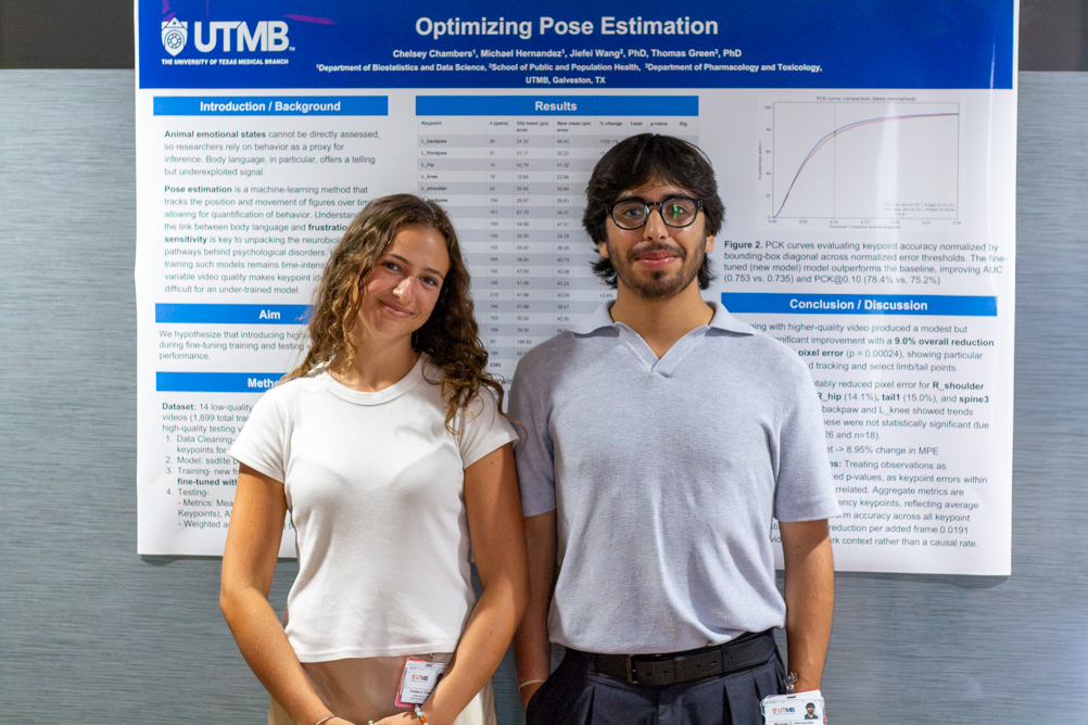 IMG_2871 Two SIBDS students stand beside a poster titled “Optimizing Pose Estimation.”