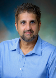 Portrait of Neil Mehta, PhD, MSc, MA
