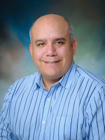 Portrait of Cesar Ugarte-Gil, MD, MSc, PhD