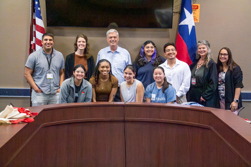 Group photo of UTMB School of Public and Population Health students with Dr. Philip Keiser and Galveston County Health District staff during a Public Health Practice II visit at GCHD.