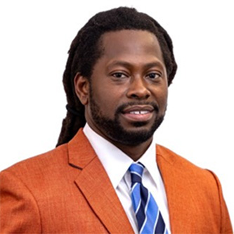 Professional headshot of Khamron Micheals