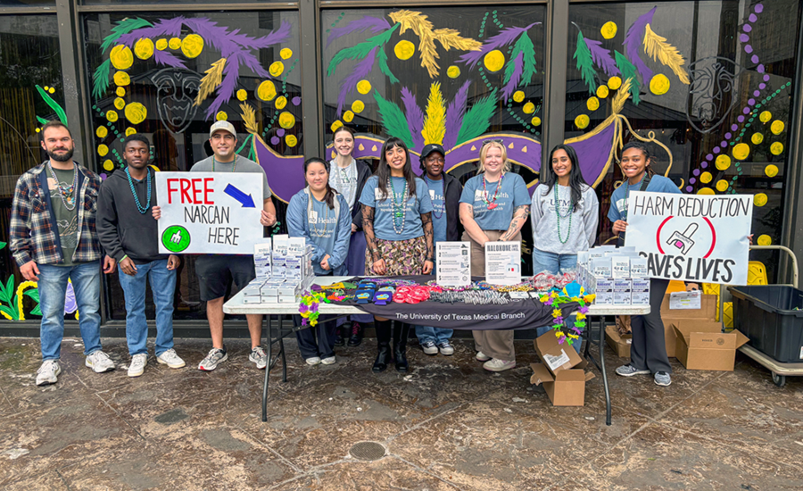 A group of MPH students distributing Narcan at Mardi Gras
