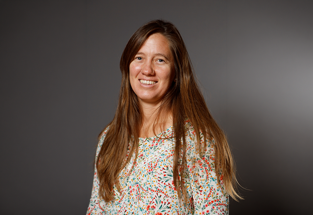 A professional headshot of Amie Hufton