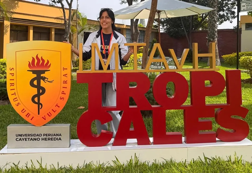 Monserrat stands behind IMTAvH Tropicales sign
