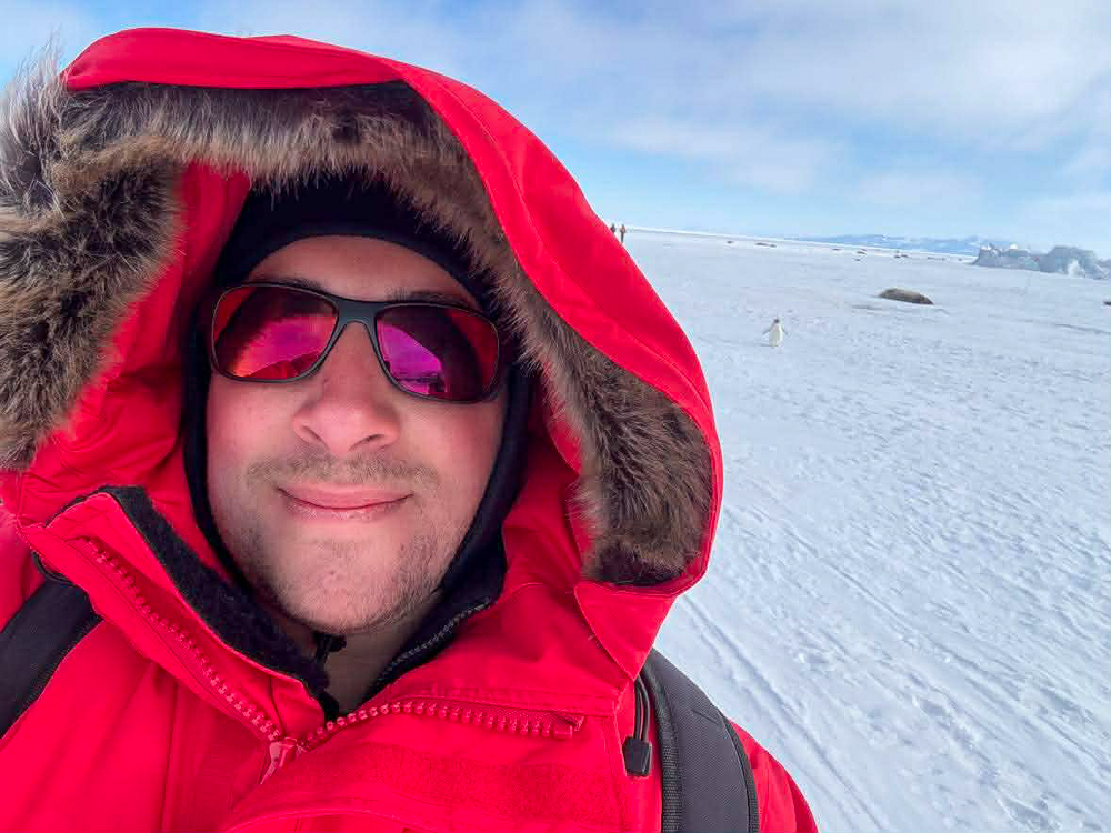 A photo of Vasilis wearing a heavy coat while on polar rotation