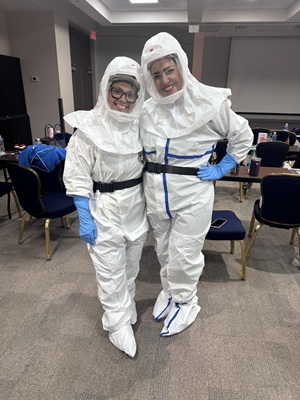 Nurses Donning High Level PPE