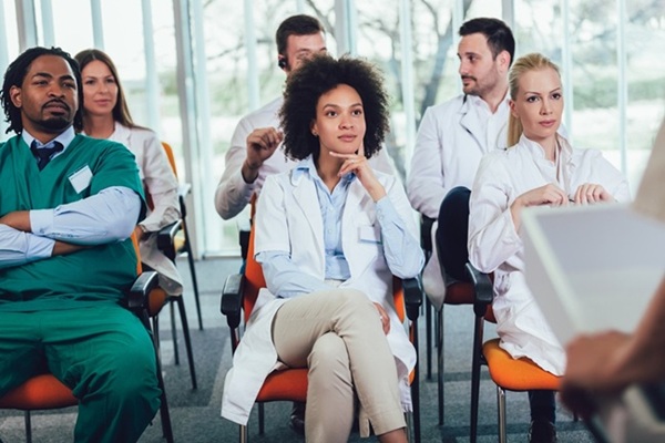 Group of people listening to lecture
