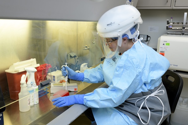 Lab Personnel handling pathogen