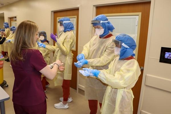 SON Training 4 Nursing students donning PPE