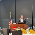 Dr. Mauricio Nogueira speaks to conference attendees