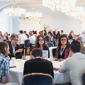 group of attendees speak about conference
