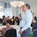 symposium speaker speaks to attendees