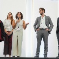 trainee presentation and poster winners address the crowd