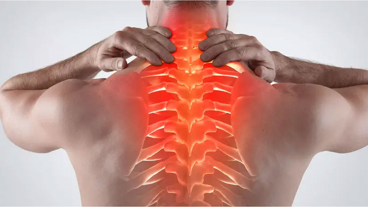 A man's back is shown with the spine appearing in red to indicate pain.