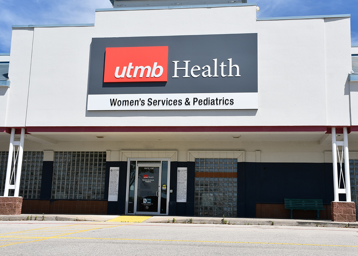 A building with a sign that says UTMB Health Regional Women's Services and Pediatrics