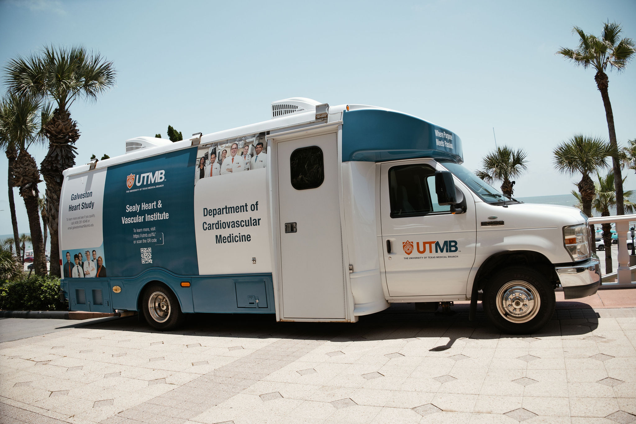 The Sealy Heart and Vascular Institute vehicle, which will be used for community and patient outreach, was on display at the conference. A large van displaying logos for UTMB and the Sealy Vascular Institute is parked in front of the conference hotel on the seawall.