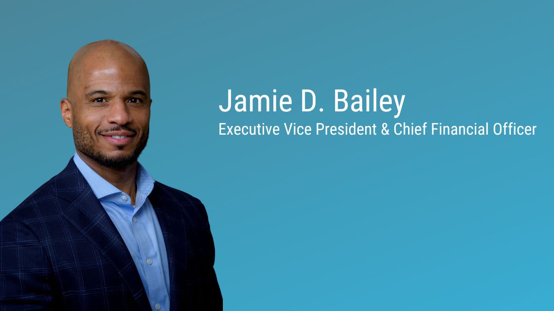 Against a blue background, a person in a dark jacket and light dress shirt appears from the chest up beside text that reads “Jamie D. Bailey, Executive Vice President & Chief Financial Officer.”