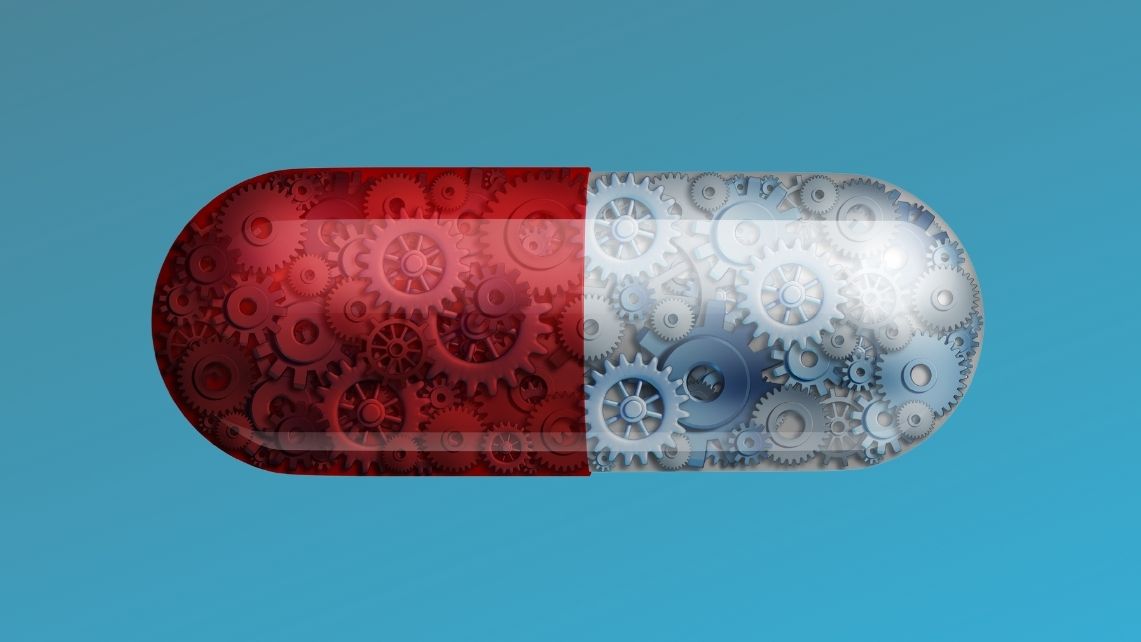 An image of a pill capsule full of gears