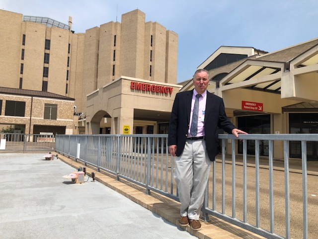 Dr. Dietrich Jehle, Chair of the Department of Emergency Medicine, stands outside the ER at teh Galveston Campus