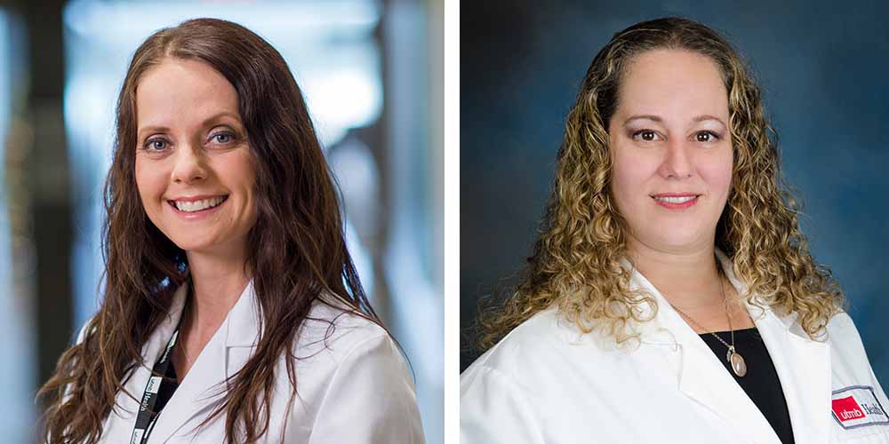 Side‑by‑side professional portraits of UTMB physicians Dr. Gal Levy and Dr. Shannon Clark wearing white lab coats