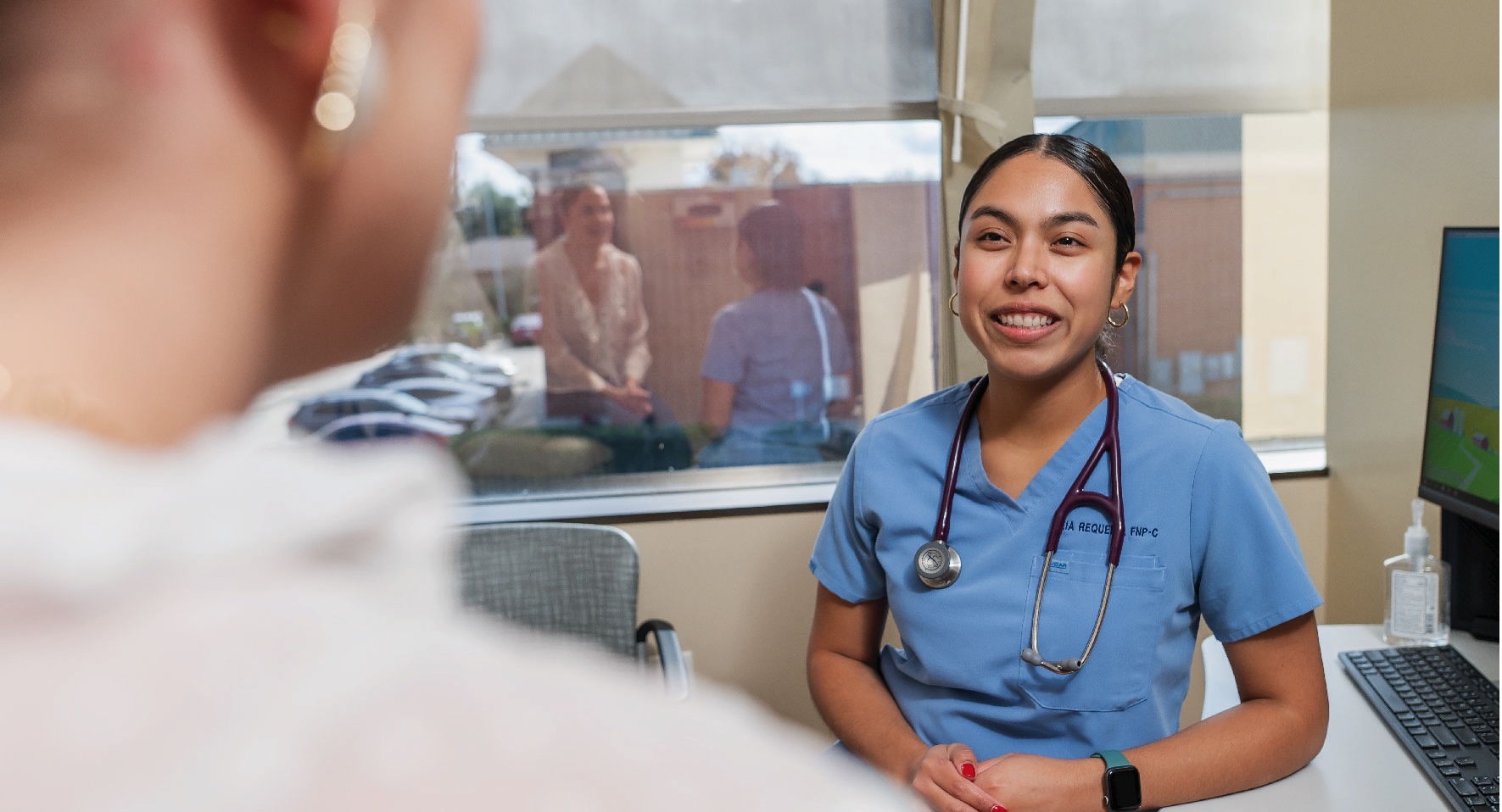 Doctor talking with patient about new year health goals.