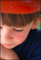 boy in red cap