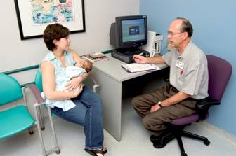 Dr. McCormick with mom and baby